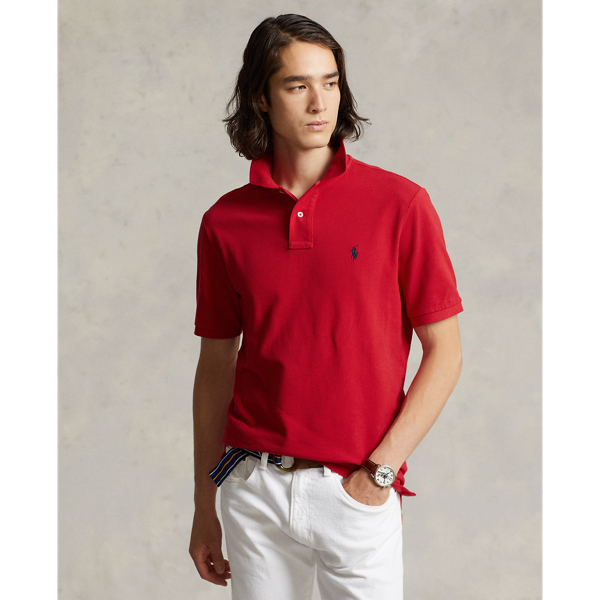 An American style standard since 1972, the Polo shirt has been imitated but never matched. Over the decades, Ralph Lauren Lauren has re-imagined his signature style in a wide array of colours and fits, yet all retain the quality and attention to detail of the iconic original. This trim version is made from our highly breathable cotton mesh, which offers a textured look and a soft feel.