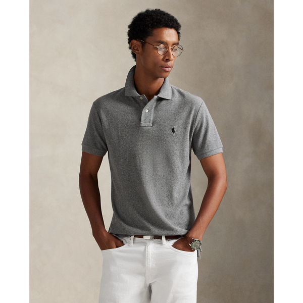 An American style standard since 1972, the Polo shirt has been imitated but never matched. Over the decades,  Ralph Lauren Lauren has re-imagined his signature style in a wide array of colours and fits, yet all retain the quality and attention to detail of the iconic original. This trim version is made from our highly breathable cotton mesh, which offers a textured look and a soft feel.