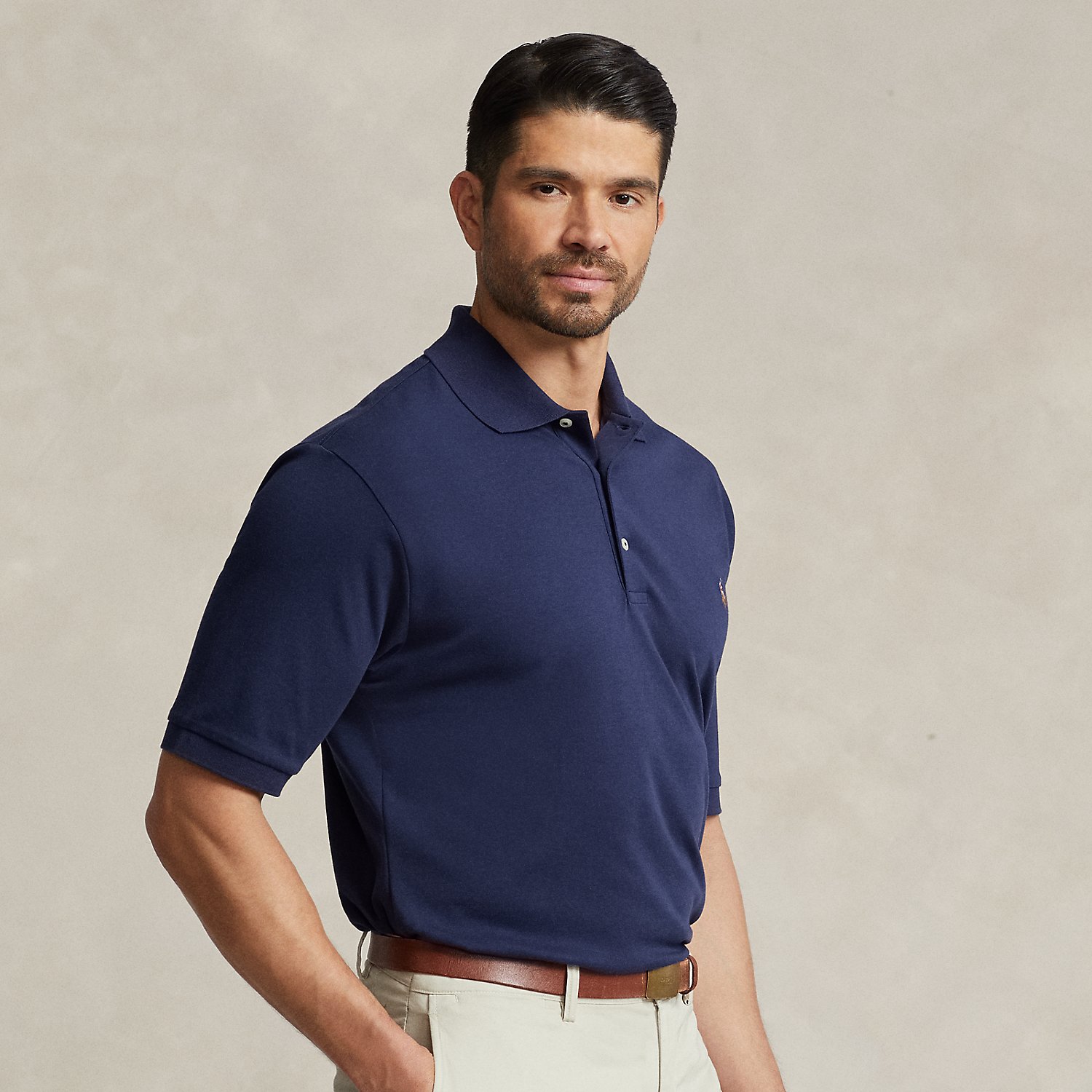 An American style standard since 1972, the Polo shirt has been imitated but never matched. Over the decades, Ralph Lauren Lauren has re-imagined his signature style in a wide array of colours and fits, yet all retain the quality and attention to detail of the iconic original. This Big & Tall version is made from luxe cotton interlock featuring an ultra-soft finish.