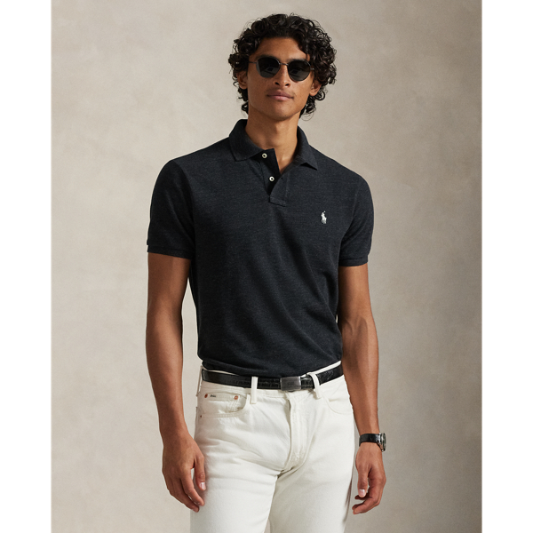 An American style standard since 1972, the Polo shirt has been imitated but never matched. Over the decades, Ralph Lauren Lauren has re-imagined his signature style in a wide array of colours and fits, yet all retain the quality and attention to detail of the iconic original. This trim version is made from our highly breathable cotton mesh, which offers a textured look and a soft feel.