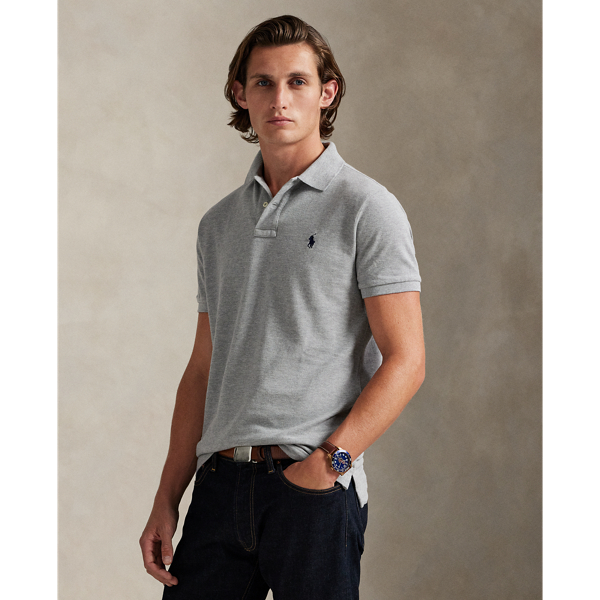 An American style standard since 1972, the Polo shirt has been imitated but never matched. Over the decades,  Ralph Lauren Lauren has re-imagined his signature style in a wide array of colours and fits, yet all retain the quality and attention to detail of the iconic original. This trim version is made from our highly breathable cotton mesh, which offers a textured look and a soft feel.
