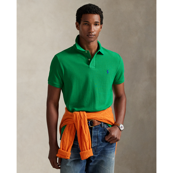 An American style standard since 1972, the Polo shirt has been imitated but never matched. Over the decades,  Ralph Lauren Lauren has re-imagined his signature style in a wide array of colours and fits, yet all retain the quality and attention to detail of the iconic original. This trim version is made from our highly breathable cotton mesh, which offers a textured look and a soft feel.