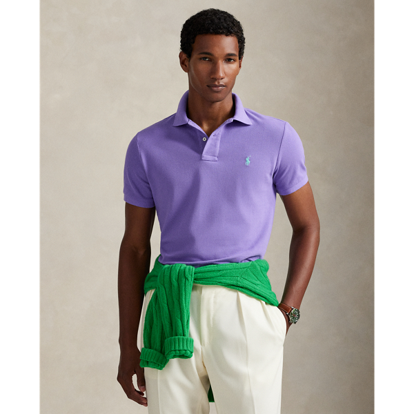An American style standard since 1972, the Polo shirt has been imitated but never matched. Over the decades,  Ralph Lauren Lauren has re-imagined his signature style in a wide array of colours and fits, yet all retain the quality and attention to detail of the iconic original. This trim version is made from our highly breathable cotton mesh, which offers a textured look and a soft feel.