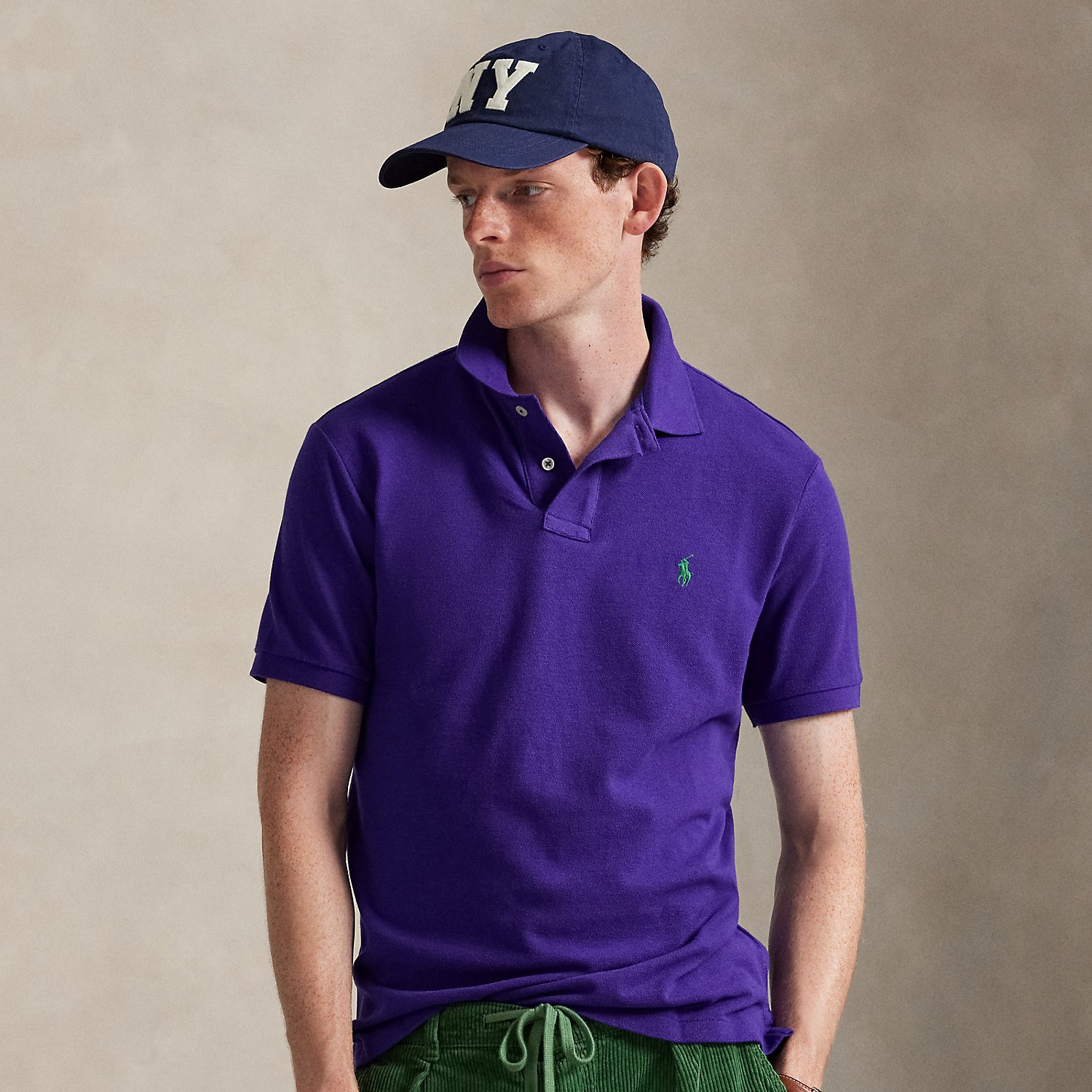 An American style standard since 1972, the Polo shirt has been imitated but never matched. Over the decades, Ralph Lauren Lauren has re-imagined his signature style in a wide array of colours and fits, yet all retain the quality and attention to detail of the iconic original. This trim version is made from our highly breathable cotton mesh, which offers a textured look and a soft feel.