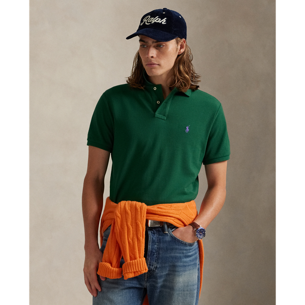 An American style standard since 1972, the Polo shirt has been imitated but never matched. Over the decades,  Ralph Lauren Lauren has re-imagined his signature style in a wide array of colours and fits, yet all retain the quality and attention to detail of the iconic original. This trim version is made from our highly breathable cotton mesh, which offers a textured look and a soft feel.
