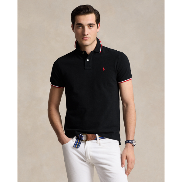 An American style standard since 1972, the Polo shirt has been imitated but never matched. Over the decades, Ralph Lauren Lauren has re-imagined his signature style in a wide array of colours and fits, yet all retain the quality and attention to detail of the iconic original. This trim version is made from our highly breathable cotton mesh, which offers a textured look and a soft feel.