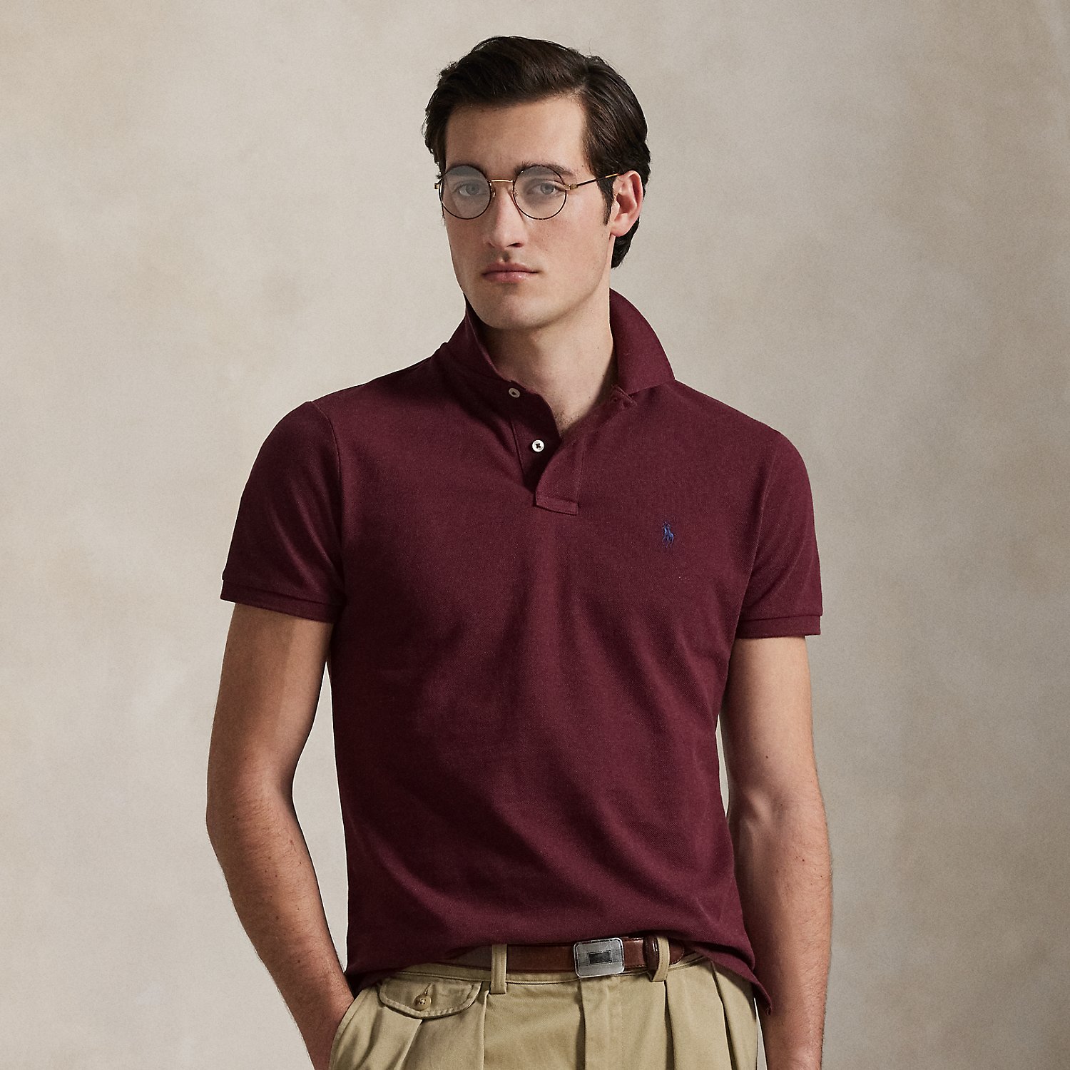 An American style standard since 1972, the Polo shirt has been imitated but never matched. Over the decades, Ralph Lauren Lauren has re-imagined his signature style in a wide array of colours and fits, yet all retain the quality and attention to detail of the iconic original. This trim version is made from our highly breathable cotton mesh, which offers a textured look and a soft feel.