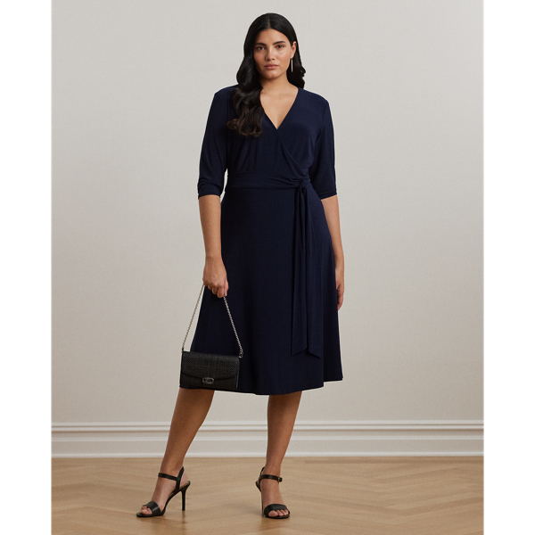 We call this the perfect everyday dress, as it hits below the knee and features a flattering surplice neckline. Its jersey construction creates comfort and ease of movement, while a self-tie sash accentuates the natural curves of the waist.