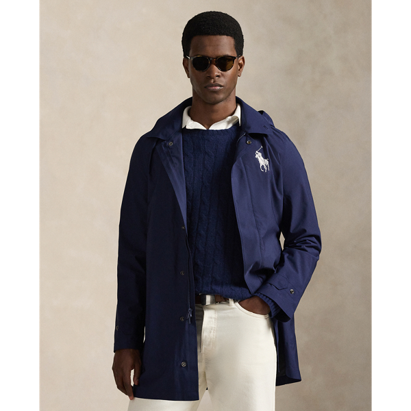 Part of our collection celebrating Wimbledon 2025, this unisex walking coat was designed exclusively for the tournament's umpire uniform. It is made from water-resistant twill and constructed with a fully seam-sealed interior. In addition to the tournament's official logo patch, it features our iconic Big Pony.