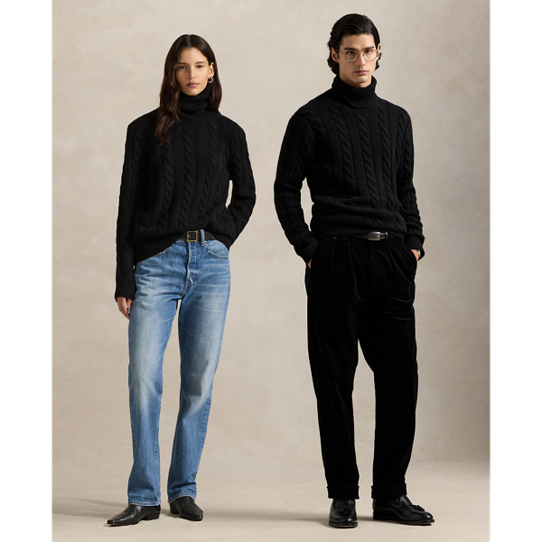 This unisex version of our iconic cable-knit roll neck jumper is knit with an Italian wool yarn that’s spun with a hint of cashmere.