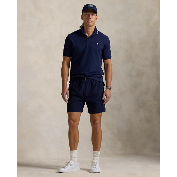 Part of our collection celebrating Wimbledon 2025, these shorts are designed exclusively for the tournament's ballperson uniform. Their moisture-wicking fabric is made with extra stretch for enhanced comfort. They are constructed with mesh-panelled compression shorts in the interior.
