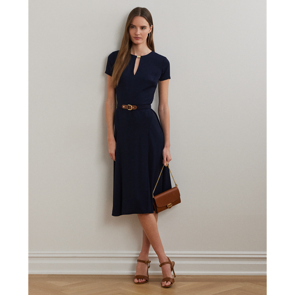 Detailed with a signature plaque on the neck, this fit-and-flare dress is rendered in silky georgette for a luxurious hand and sweeping movement. A faux-leather "LRL"-engraved buckled self-belt completes the look.