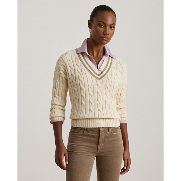 Distinguished by its contrast stripes and cable-knit pattern, this version of Lauren  Ralph Lauren Lauren's iconic cricket jumper is crafted with ultrasoft combed cotton. An "LRL"-embroidered logo on the hem completes the look.