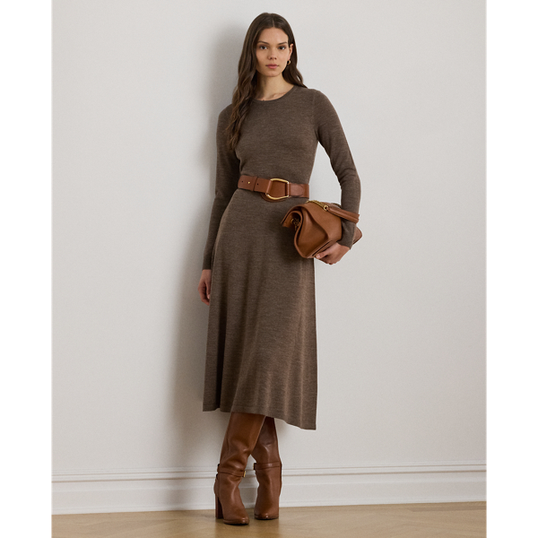 A timeless addition to your cool-weather wardrobe, this crewneck jumper dress features a midi-length A-line silhouette rendered in soft, worsted wool.