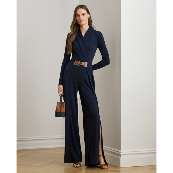 Crafted from smooth stretch jersey, this surplice jumpsuit features a wide-leg silhouette with a wrap-style overlay at the trousers and an equestrian-inspired faux-leather buckled tab at the waist.