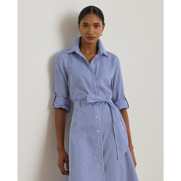 Yarn-dyed with slender vertical stripes, this iteration of Lauren Ralph Lauren Lauren's roll-tab-sleeve shirtdress is crafted with lightweight cotton broadcloth for a tailored look. A belted waist enhances this style's fit-and-flare silhouette, while signature buttons add an iconic finish.