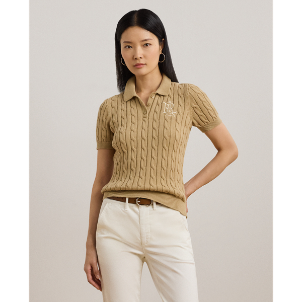Crafted from combed cotton for a soft hand, this piece unites a timeless Polo shirt silhouette with the comfort of a cable-knit jumper. It's detailed with Lauren's signature embroidered logo and "LRL"-engraved buttons.