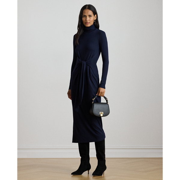 Rib-knit from a soft stretch-cotton blend, this roll neck dress is cut for a slim-fitting silhouette and a calf-grazing midi length. A tie-front design on the waist adds contemporary flare to this refined piece, while slits on the hem afford ease of movement.