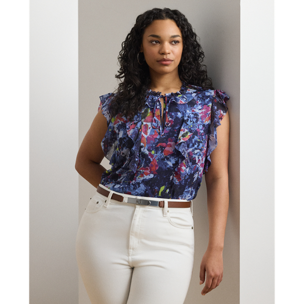 Cascading ruffles, flutter sleeves and crinkle georgette bring an airy look and feel to this tie-neck blouse, which showcases the season's painterly abstract motif.