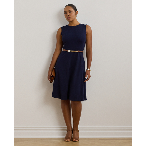 Straddle-stitched princess seams accentuate the fit-and-flare silhouette of this sleeveless dress, which is crafted with smooth, stretch-infused ponte.