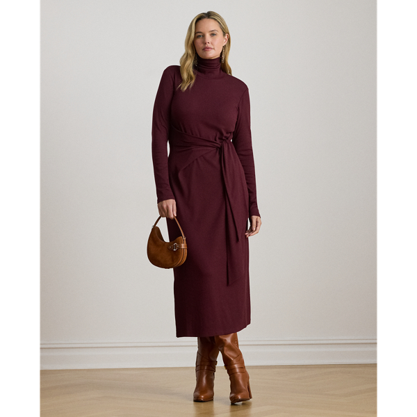 Rib-knit from a soft stretch-cotton blend, this roll neck dress is cut for a slim-fitting silhouette and a calf-grazing midi length. A tie-front design on the waist adds contemporary flare to this refined piece, while slits on the hem afford ease of movement.