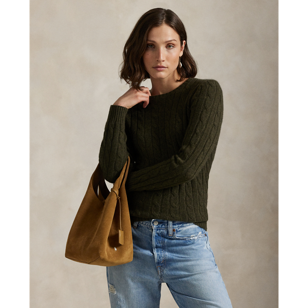 Inspired by fishermen's ropes, the cable-knit jumper's defining motif has transformed from a practical, hard-wearing construction into a symbol of collegiate style. This version is crafted from luxuriously soft cashmere, which is spun and dyed in a renowned Italian mill.