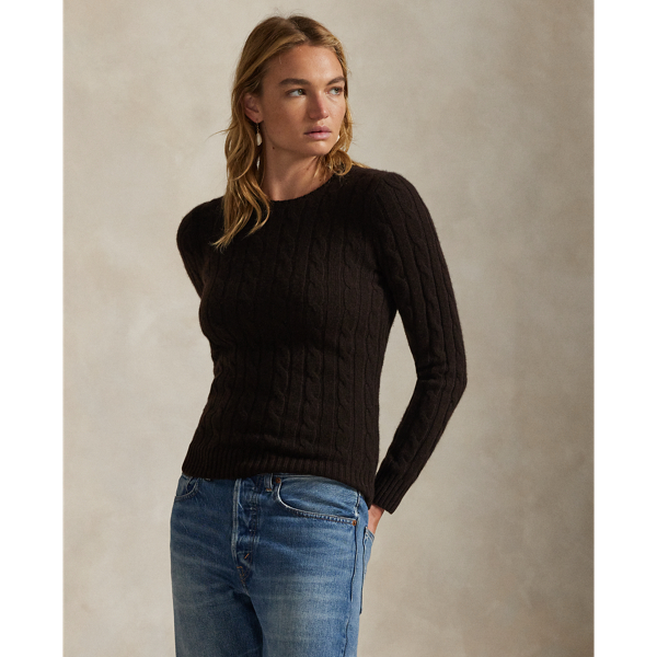 Inspired by fishermen's ropes, the cable-knit jumper's defining motif has transformed from a practical, hard-wearing construction into a symbol of collegiate style. This version is crafted from luxuriously soft cashmere, which is spun and dyed in a renowned Italian mill.