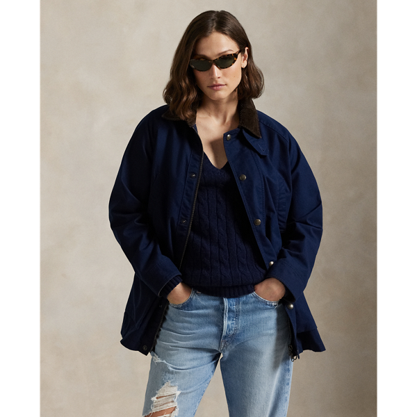 Woven with cotton for a medium weight, this workwear-inspired utility jacket has a relaxed shape outfitted with a corduroy collar, patch pockets and signature engraved metal snaps.