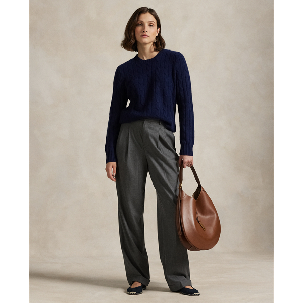 Designed for a tailored drape, these Italian stretch-wool flannel trousers unite a high-rise waist and wide-leg silhouette. Pressed creases and folded cuffs complete the look.