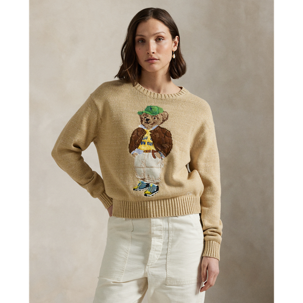 This cotton crewneck jumper showcases an intarsia-knit and embroidered rendering of the Polo Bear donning a  Ralph Lauren Lauren look, complete with a signature Pony ball cap.