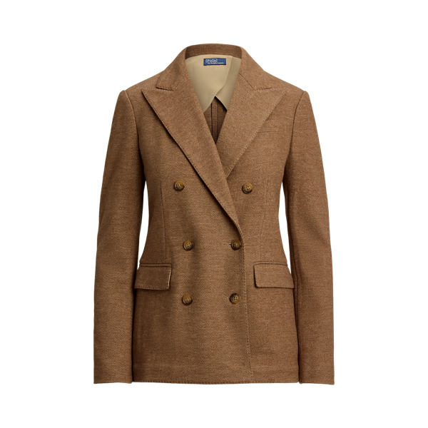 This double-breasted blazer is crafted with medium-weight wool-and-cotton fabric featuring a timeless herringbone weave and a lambskin suede undercollar.