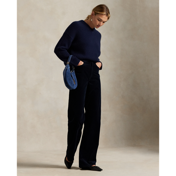 Rendered in wide-wale cotton corduroy, these trousers are cut for a wide-leg silhouette with a high-rise waist and subtle flare.