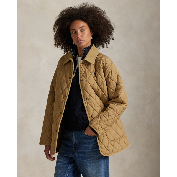 Featuring a quilted construction, this lightly insulated barn jacket is crafted with water-repellent fabric that is accented with cotton corduroy trim and finished with our signature embroidered Pony.