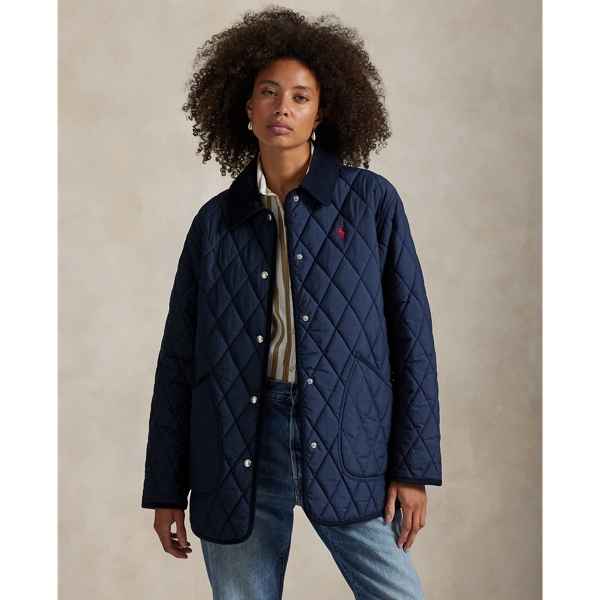 Featuring a quilted construction, this lightly insulated barn jacket is crafted with water-repellent fabric that is accented with cotton corduroy trim and finished with our signature embroidered Pony.
