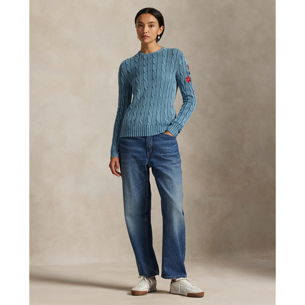 Treated for a high-low effect, this version of our cotton cable-knit jumper features an embroidered motif at the sleeve that unites colourful florals, a dove and  Ralph Lauren Lauren's monogram logo.
