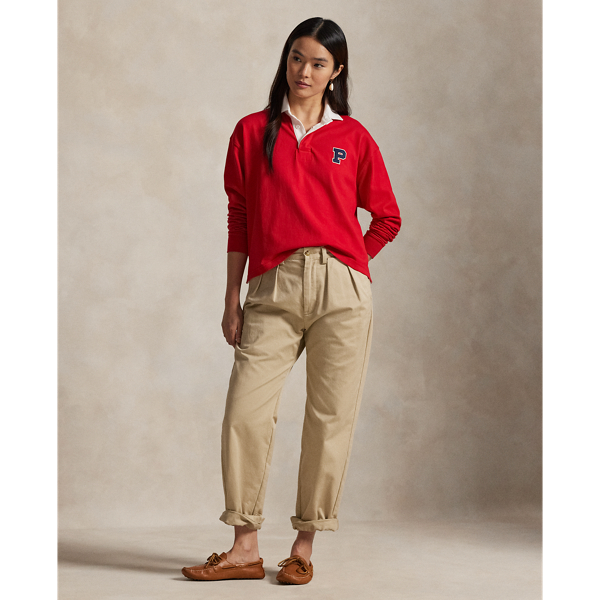 Made from a heavier-weight cotton jersey selected for its vintage aesthetic, this slightly cropped rugby shirt is adorned with a "P" logo patch and features traditional rugby shirt details.