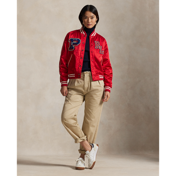 Varsity-inspired style defines this lightly filled bomber jacket, which is cut from satin for a luxe sheen and detailed with striped rib-knit trim. Signature patches and embroidery detail the chest and back.