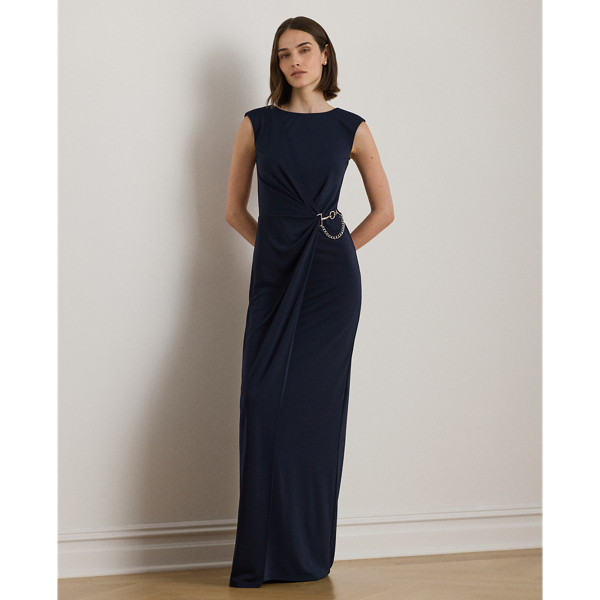 Embodying Ralph Lauren Lauren's elegant sensibility, this cap-sleeve gown is designed with an open V-back and an equestrian-inspired buckle-and-chain embellishment on the waist. This style's column silhouette is crafted from smooth stretch jersey for a graceful drape.