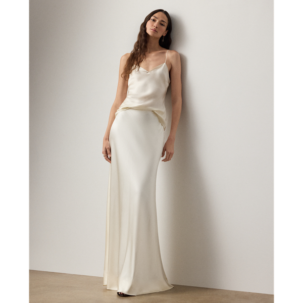 The Masina skirt is designed with an elegant floor-sweeping silhouette and masterfully cut in Italy with stretch-infused satin, which is coveted for its beautiful sheen and fluid drape.