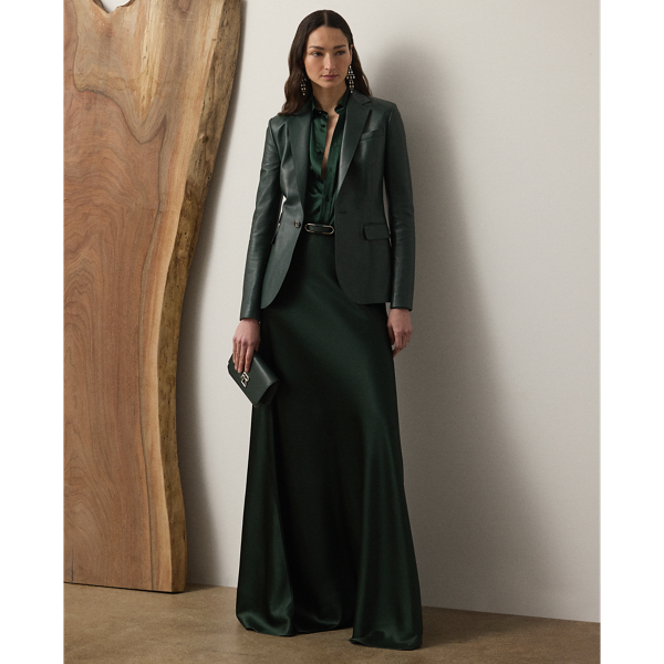 The Masina skirt is designed with an elegant floor-sweeping silhouette and masterfully cut in Italy with stretch-infused satin, which is coveted for its beautiful sheen and fluid drape.