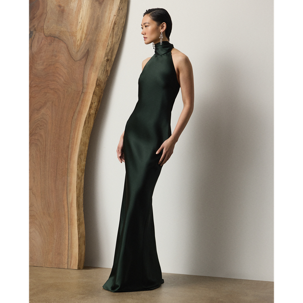 Originating in Spring 2023, the Chilton showcases Mr Lauren's ability to transform timeless silhouettes into modern designs. Crafted in Italy with stretch-infused satin, which is coveted for its beautiful sheen and fluid drape, this evening gown is distinguished by a halter silhouette with self-ties, which cascade beautifully down its dramatic open back.