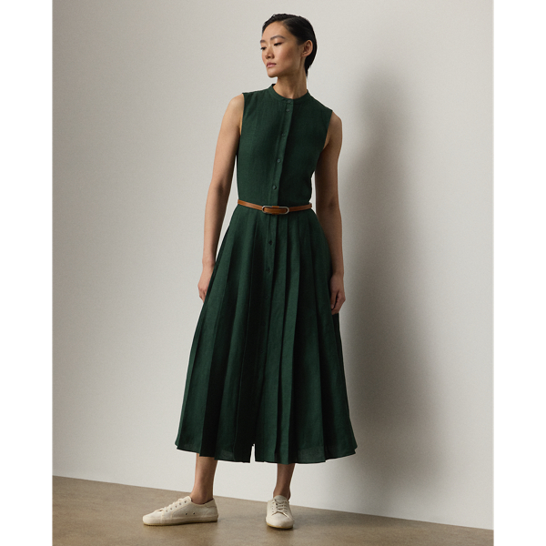 Inspired by our Freida dress, the Kennedi's studied design unites four linen panels, which have undergone a heat-press fabric manipulation technique to create a stunning pleated effect on the skirt. Crafted from rustic-yet-chic Italian linen in a classic construction for season-spanning wear, this day dress is cinched at the waist with a self-belt centred by a signature " Ralph Lauren Lauren"-engraved plaque buckle.
