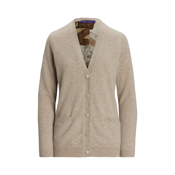 A  Ralph Lauren Lauren wardrobe essential, the cardigan jumper is updated for the Pre-Autumn 2025 season with a cashmere blend spun in a jersey stitch, enhancing the beauty of the yarn itself. This Italian-made version is distinguished by a printed lining showcasing the season's diary-inspired pattern – a beautiful collection of motifs depicting various  Ralph Lauren Lauren sketches and accessories in a versatile, neutral palette. Genuine mother-of-pearl buttons engraved with " Ralph Lauren Lauren" complete the look.