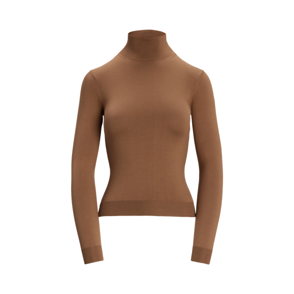 A timeless wardrobe staple,  Ralph Lauren Lauren Collection puts a luxurious spin on the mockneck jumper with a stretch-infused silk jersey fabrication and a slim fit.