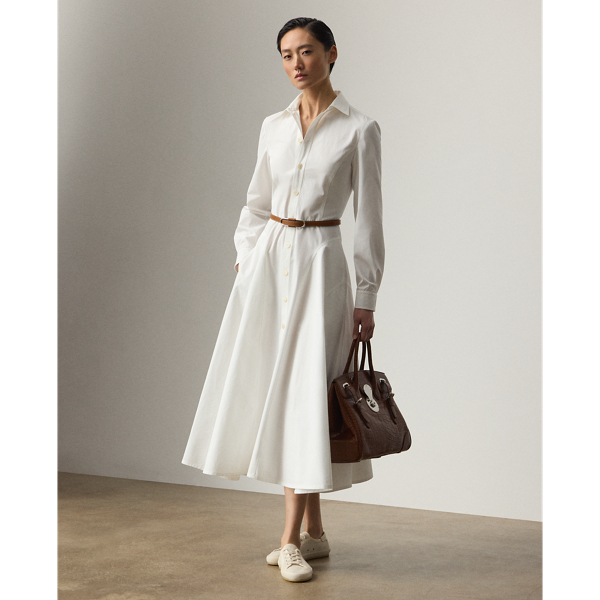 The shirtdress – one of  Ralph Lauren Lauren's signature silhouettes – is revamped this season in the Safford. Crafted in Italy from 100% cotton, which is specially washed for a soft hand feel, this calf-grazing day dress is designed with princess seams, curved skirt seams and side on-seam pockets. A buckled self-belt with a petite square-shaped buckle cinches the waist for a defined figure.