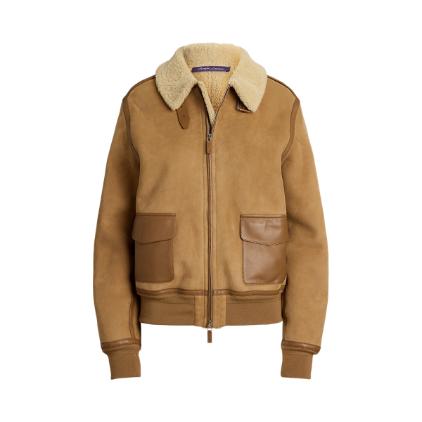 Inspired by traditional flight jackets, the Morrison coat is crafted from a luxurious combination of textures, including soft, ultra-lightweight wool shearling, which displays a semi-curly interior and a smooth suede exterior, and supple lambskin taping for a sophisticated yet dynamic contrast, which enhances the relaxed-fitting design of this coat. Additional details, including a lambskin buckled throatlatch, rib-knit cuffs and hem, and lambskin flapped pockets, complete the look.