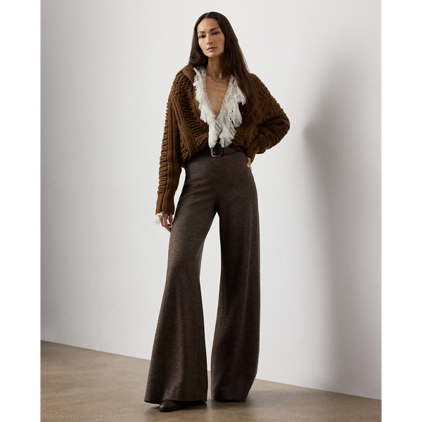 The wide-leg Isaiah trouser is distinguished by its flattering high rise, a clean waistband with back waist darts and crisp creases. Crafted in Italy, this timeless style is made with tick-weave wool jersey for a remarkable drape and soft hand feel.
