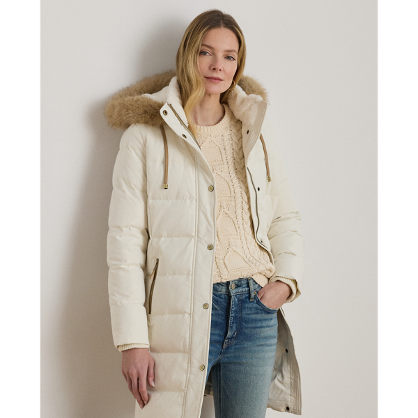 Equal parts stylish and practical, this channel-quilted coat is designed with a detachable, faux fur-trimmed hood, a water-resistant shell and cosy 450-fill-power down to keep you dry and warm. Front and back princess seams enhance this style’s streamlined silhouette, while “LRL”-engraved metal snaps add signature style.