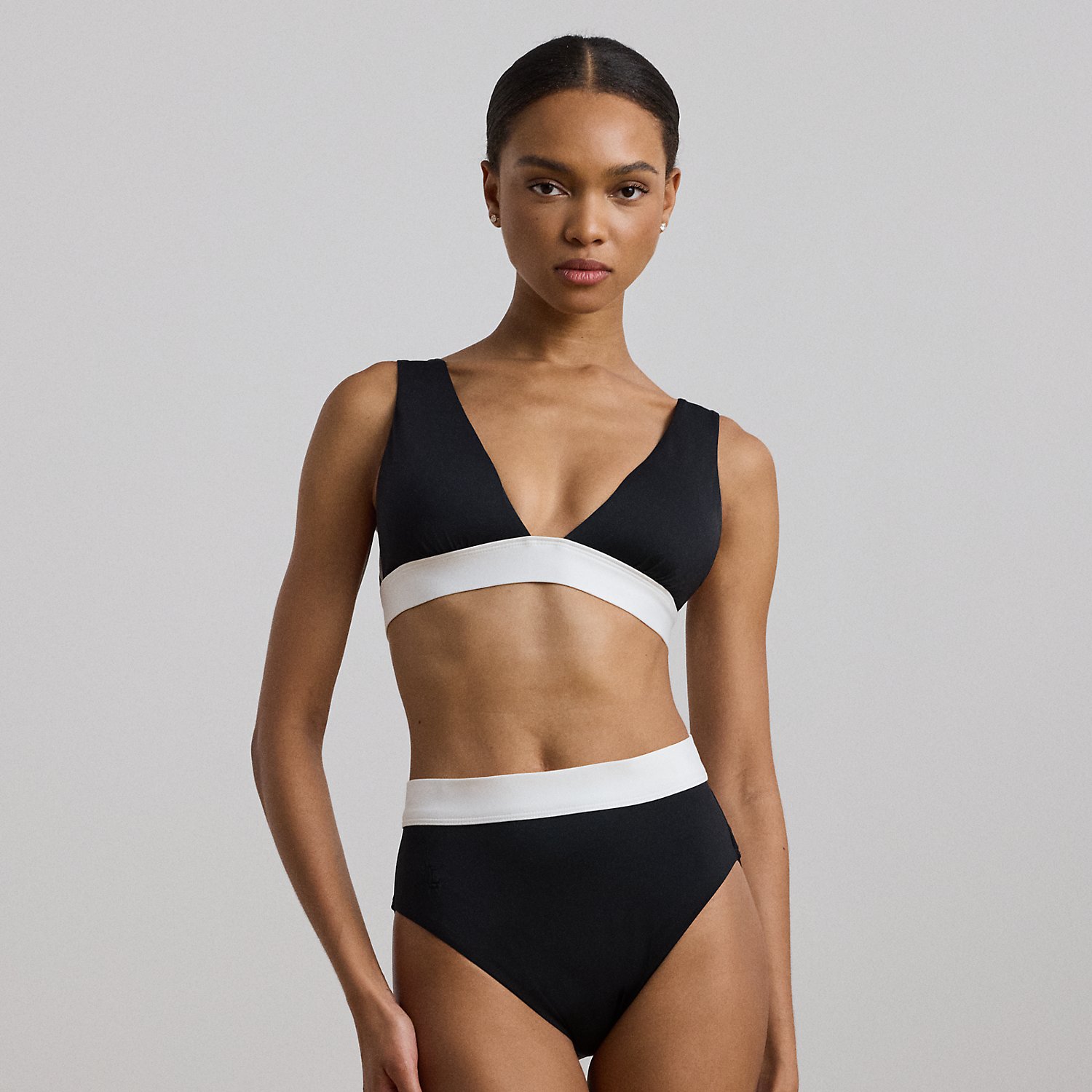 Punctuated with an “LRL”-embroidered logo on the hip, this two-tone bikini bottom is designed with delicate shirring and a high-waisted silhouette for a flattering fit.