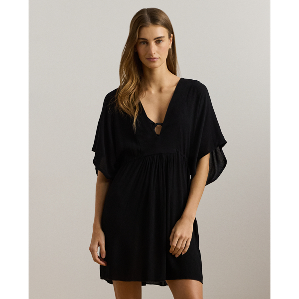 Featuring an elasticated drawcord waist to ensure the perfect fit, this airy tunic cover-up features a deep V-neck and a breezy, relaxed fit.